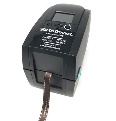 a photo of a printer with a roll of film on it