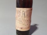 a bottle of wine that is sitting on a table