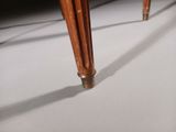 a close up of a wooden table with a glass top