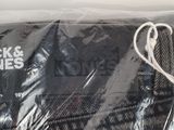 a black and white picture of a black and white blanket