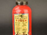 a red fire extinguisor with a bird on top of it