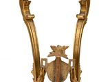 an image of a table with a coat of arms and a shield on it