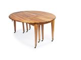 an image of a wooden table with four legs and a round table top