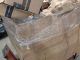 a cart full of boxes sitting in a store