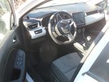 a picture of a car with a steering wheel and dashboard