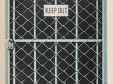 an image of a black and white photo of a gate with a keep out sign on it