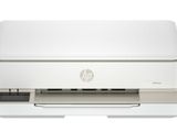 L'imprimante de bureau HP est posée sur une surface blanche