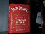 a bottle of jack daniels tennessee rye on a table