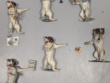 six figurines représentant un chien jouant avec une batte de baseball