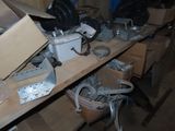 a lot of clutter on the shelves in the room
