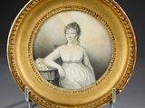 a picture of a woman in a white dress on a plate