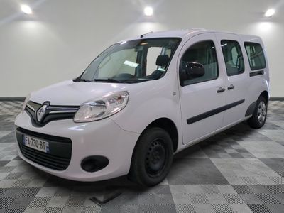 a picture of a white van on a checkered floor