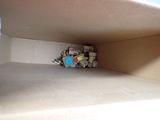 a small toy that is sitting inside of a box