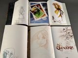 several sketches of a woman and a man are shown in an open book