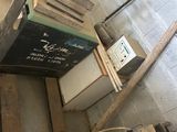 a pile of boxes that are stacked on top of each other
