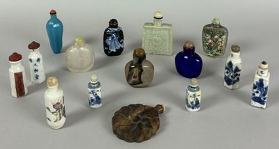 many different types of vases and bottles on the table