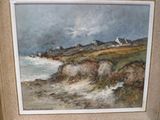 a picture of a painting of a beach with houses in the background
