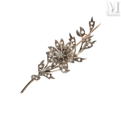 Une image représentant une broche en forme de fleur en diamant est représentée sur un fond blanc.