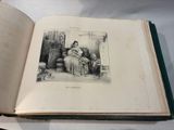 an open book with a picture of a woman sitting in a chair