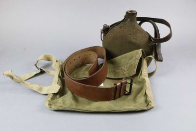 a bag with a belt and a bottle on it