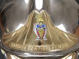 a close up of a helmet with a crest on it