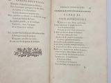 an open book with a picture of a plant on it