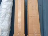 two cardboard boxes stacked on top of each other