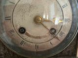 a clock that is sitting on top of a table