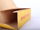 a box with a donut inside of it on a table