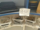 a lot of plastic containers that are sitting on a shelf