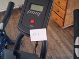 a close up of a stationary bike in a living room