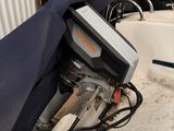 an image of a bathtub with a tv in it