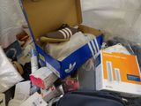 a box full of items that are sitting on the floor