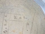 a close up of a drawing on the side of a bowl