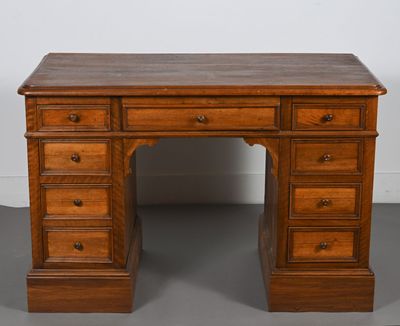 a wooden desk with drawers and drawers on top of it