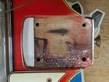 a close up of a guitar with a picture of a man on it
