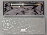 a pen that is in a box with writing on it