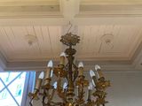a chandelier hanging from the ceiling in a room
