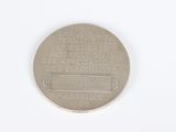 an image of a silver coin with the words international on it