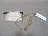 a close up of a bag with a chain on it