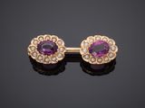 a pair of amethorate and pearl earrings