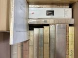 a box full of books sitting on a table
