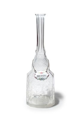 a clear glass bottle that has a label on it