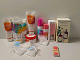 many different types of skin care products sitting on a table