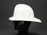 a close up of a white hard hat on a mannequin head