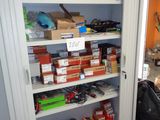 many boxes and boxes on the shelves in the room