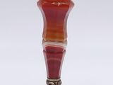an image of a red and orange vase on a white background