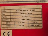 a label on the side of a machine that says filterring unit