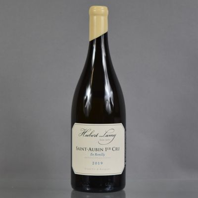 a bottle of wine that is sitting on a table