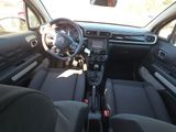 a picture of a car dashboard with a steering wheel